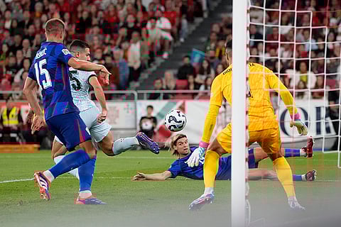 2024-25 Nations League Football Portugal vs Croatia: Portugal's Diogo Dalot, center, scores an own goal